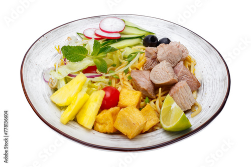 Noodles with tuna and vegetables on a white background. Isolated