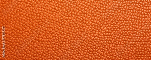 Orange leather pattern background with copy space for text or design showing the texture © Celina