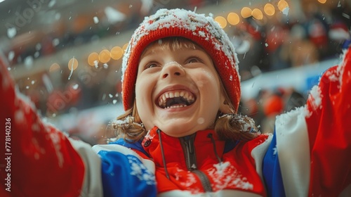 Little Girl in Red and Blue Jacket With Red and White Hat