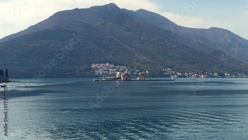 View of islands in the Bay of Kotor. The Island of Our Lady of the Rocks near the town of Perast. Adriatic Sea. Perast, Montenegro. Europe. photo