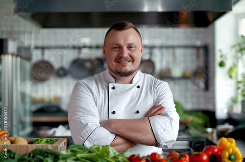 Portrait of a Cheerful Chef in a Restaurant