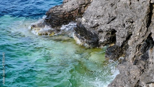 Waves hitting rocky shore