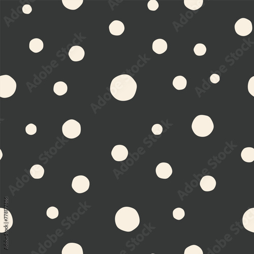 Seamless pattern with beige circles and black background