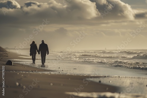 Couple walks on beach listening to music, enjoying sound of waves - canon eos 5d mark iv photo photo