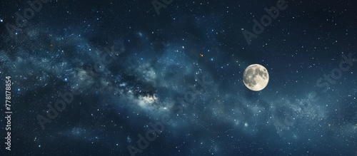 Full moon and stars in dark sky photo
