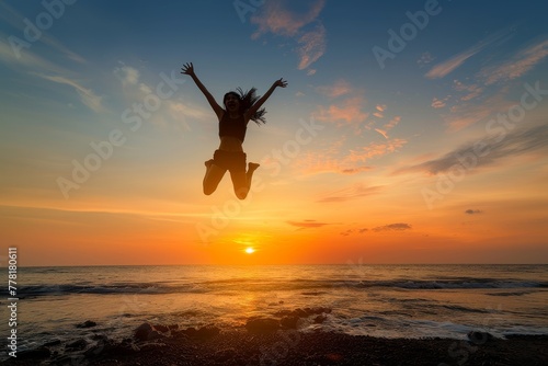 Person Jumping Into the Air at Sunset