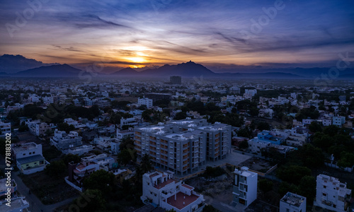 Coimbatore City with urban skyscrapers at sun set. Retro color at sunset. A big apartment in the midst of the city. Beautiful sky view photo
