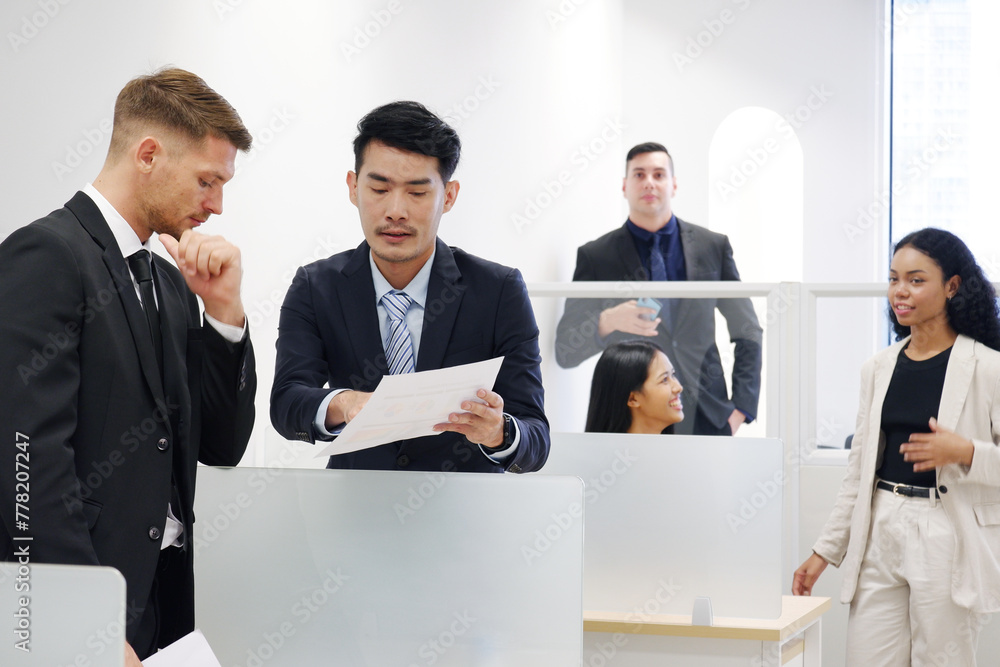 Businessmen and employees sit in the office and have a business planning meeting. business idea. Businessmen and employees sit in the office and have a business planning meeting. business idea.