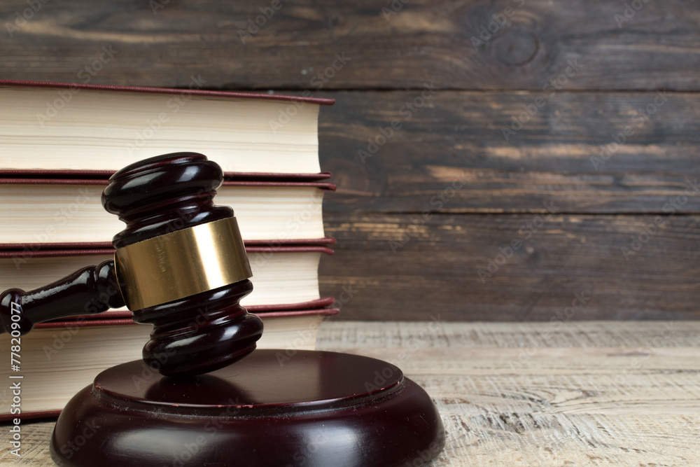 Law and Justice, Legality concept, Judge Gavel on a wooden background, Law library concept. Law and Justice, Legality concept, Judge Gavel on a wooden background, Law library concept.