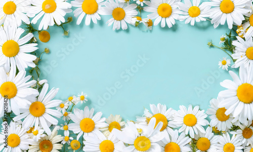 frame of daisies. Vibrant daisy frame on a turquoise background, ideal for spring and summer themes, perfect for floral business promotions, environmental campaigns, and holiday greetings. © Halyna