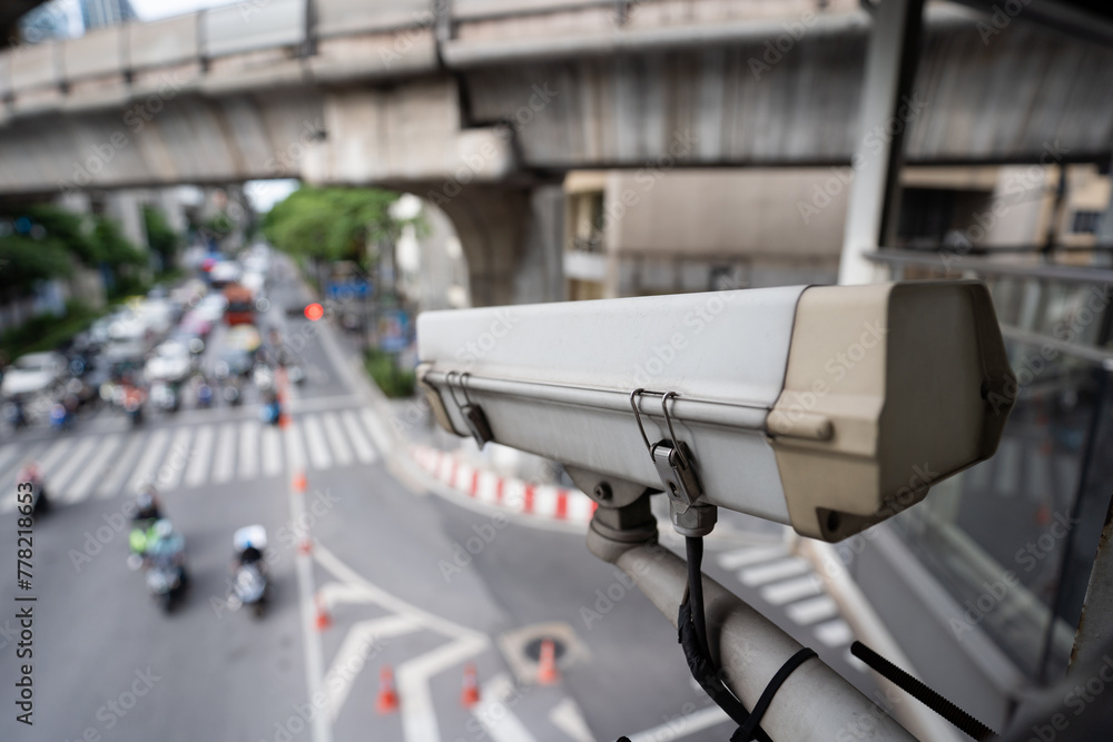 Traffic CCTV camera monitoring the city junction Traffic CCTV camera monitoring the city junction