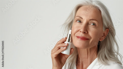 Beauty and Wellness Fusion: Supplement Bottle Mockup Held by a old modern Woman Model in Captivating Beauty Portrait on White Background