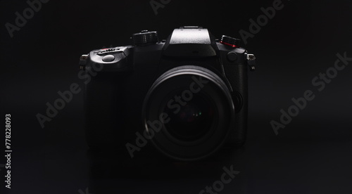 Close-up of modern camera model, good quality of pictures, brand new device for photoshot session. Technology, development, backstage, photography concept