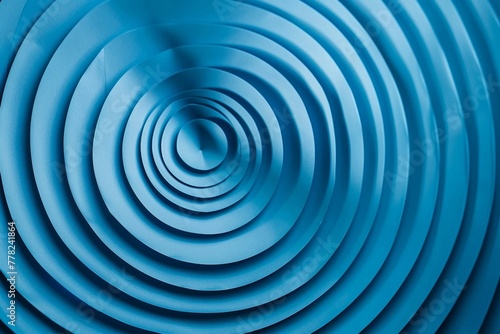 Curved lines forming concentric circles in shades of blue, abstract background
