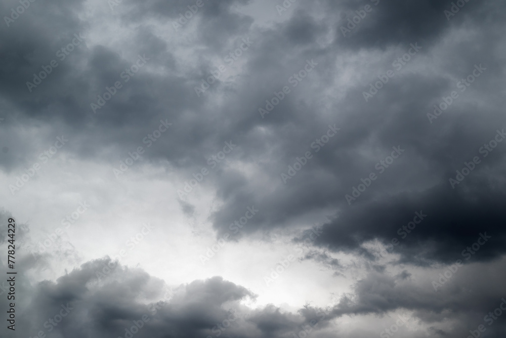 Dark grey storm clouds background Dark grey storm clouds background