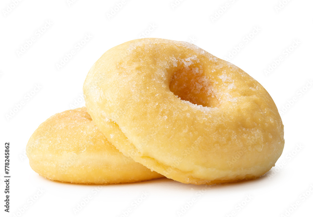 Side view of two sugar glazed cinnamon donuts in stack isolated on white background with clipping path