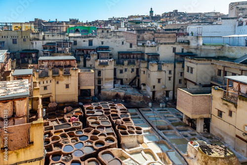 EZ, MOROCCO. Dec 05, 201The tannery in Fez. The tanning industry in the city is considered one of the main tourist attractions. The tanneries are packed with the round stone wells filled with dye