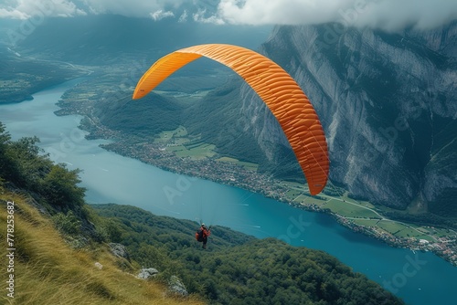 Hang Gliding Adventure Adventurous hang glider soaring above scenic landscapes