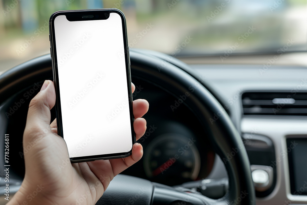 smartphone in hand close-up, inside the car at the wheel. mockup, template