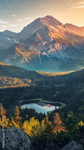 Panorama of  lake in the mountains with a forest at sunset © Vlad Kapusta