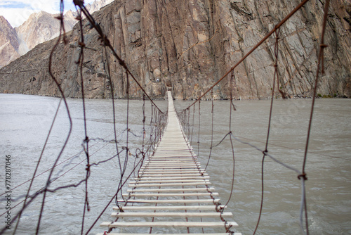 Hussaini Suspension Bridge Over Hunza River In Gojal Valley Of Hunza, Pakistan. Hussaini Suspension Bridge Is Pakistan's Most Dangerous Rope Bridge.