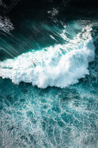 Ocean waves crashing, top down aerial drone view. Storm on sea or ocean