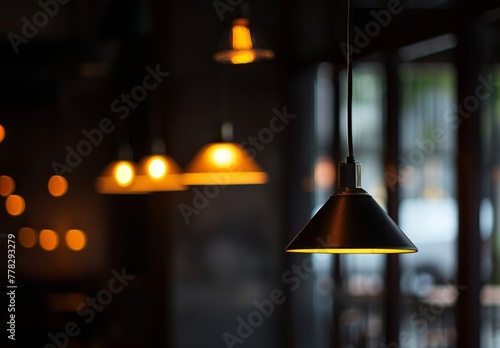 A few long lamps at different angles emit light in a dark environment  © Nicat