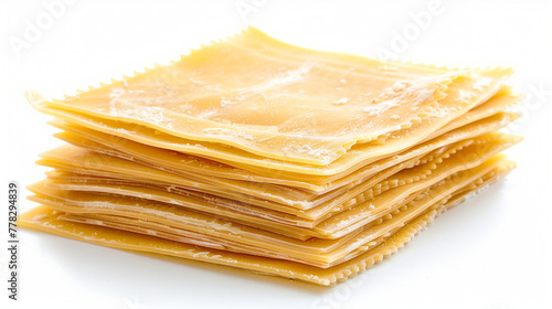 Stacked uncooked lasagna pasta sheets on white background. Aligned layering concept. Ideal for classic lasagna recipe. Design for cooking guide, food blog.