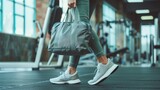 fit sporty woman in sportswear with gym bag wearing toned yoga pants and sneakers getting ready for exercise session at gym, lifestyle, fitness, healthy, fit, workout, jogger