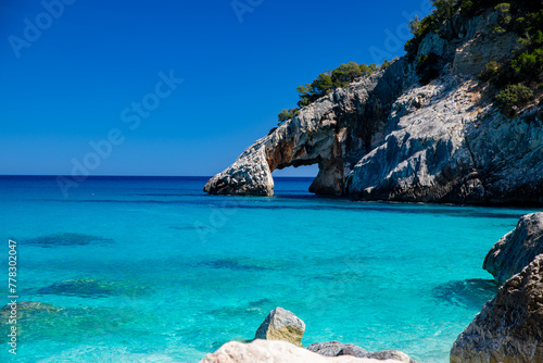 Fototapeta Naklejka Na Ścianę i Meble -  Cala Goloritzé, an azure beach located in the town of Baunei, in the southern part of the Gulf of Orosei, in the Ogliastra region of Sardinia.