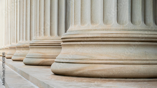 Architectural detail of some neoclassic columns in a row. photo