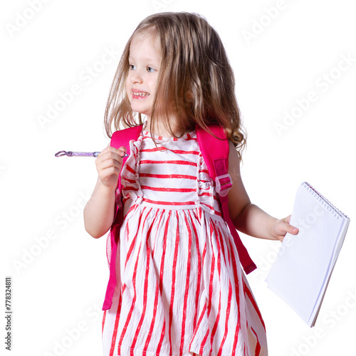 Girl child with backpack and notebook with pen in hands on white background isolation. Childhood, education, products children