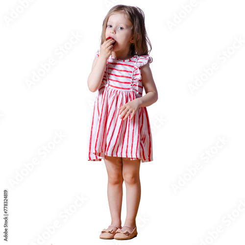 Little girl child in dress eating strawberry on white background isolation