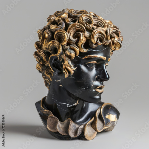 A black and gold marble sculpture of an ancient Greek man with curly hair
