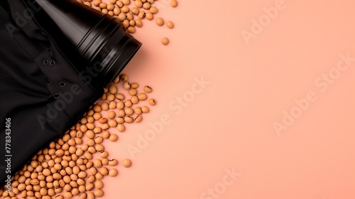 Soybean with coffeecup on isolated pink background photo