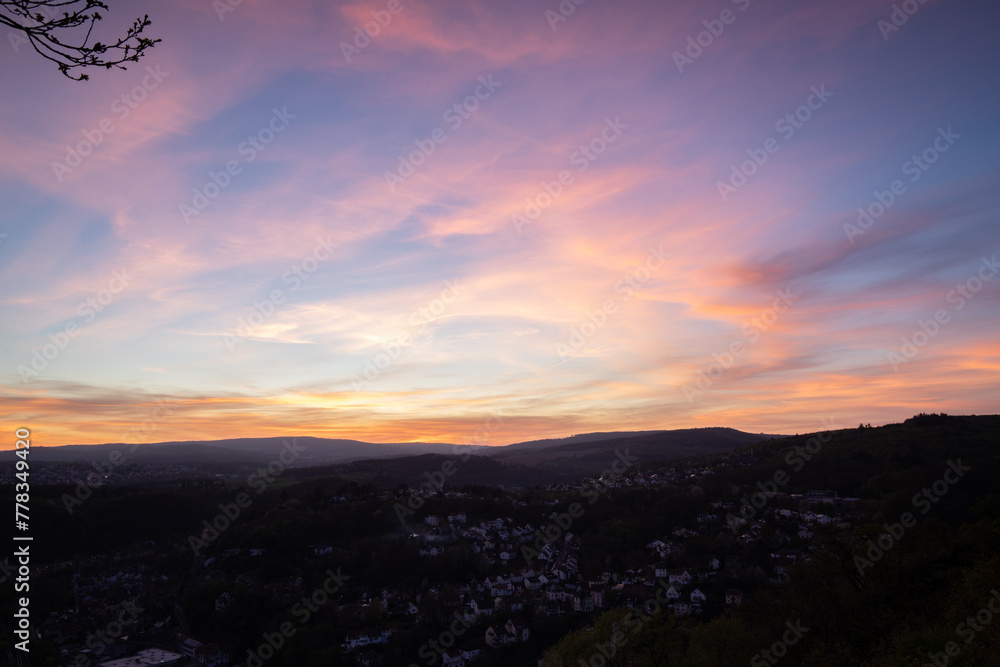 Landscape at sunrise. Beautiful morning environment with fresh greenery in spring. A small place in the middle of nature. taken from a small mountain, Taunus, Hesse, Germany Landscape at sunrise. Beautiful morning environment with fresh greenery in spring. A small place in the middle of nature. taken from a small mountain, Taunus, Hesse, Germany