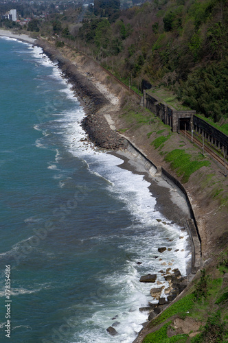 Bird's eye view of the seashore and a railroad tunnel