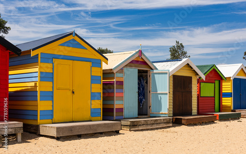 Beautiful bathing houses on white sandy beach at Brighton in Melbourne, Australia. © majonit