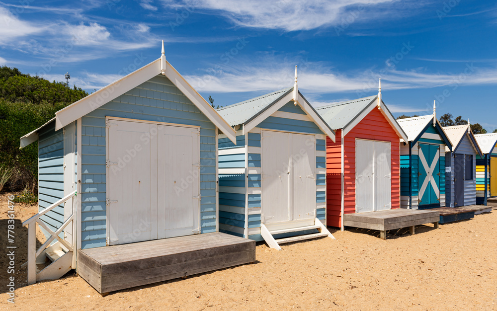 Naklejka premium Beautiful bathing houses on white sandy beach at Brighton in Melbourne, Australia.