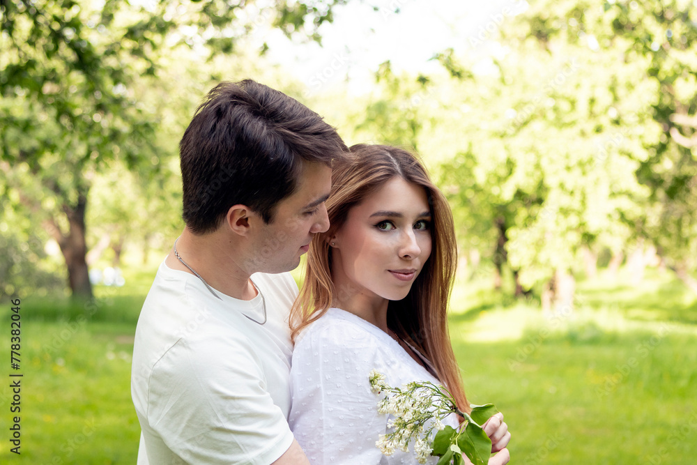 young couple in love on a picnic in summer park young couple in love on a picnic in summer park