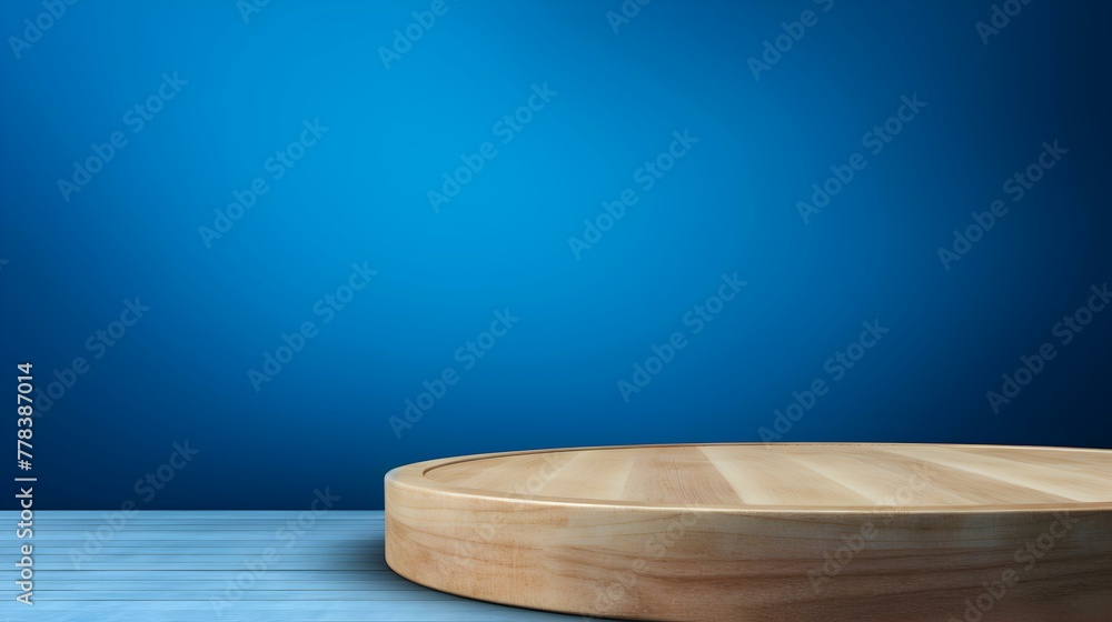 Close up of a round wooden Pedestal for Product Presentation. Empty blue Showroom Close up of a round wooden Pedestal for Product Presentation. Empty blue Showroom