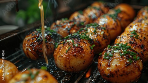 cooking takoyaki is a popular delicious snack in Japan