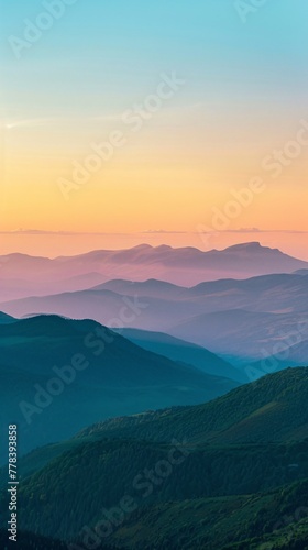 Sunset over majestic mountain peaks.