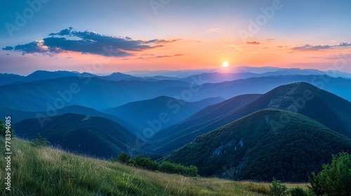 Sunset over majestic mountain peaks. © Vlad Kapusta