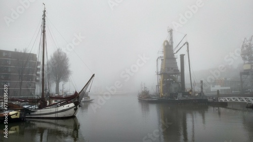 Foggy view of a canal in Rotterdam, Netherlands