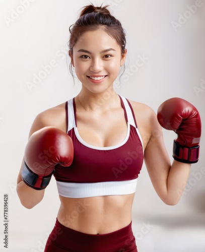 Young and Beautiful Asian Girl in Red Bra and Boxing Gloves