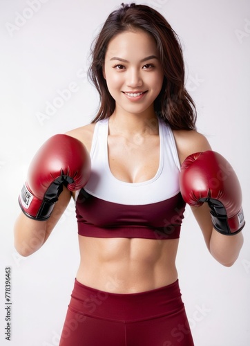 Young and Beautiful Asian Girl in Red Bra and Boxing Gloves © Rimstockphoto