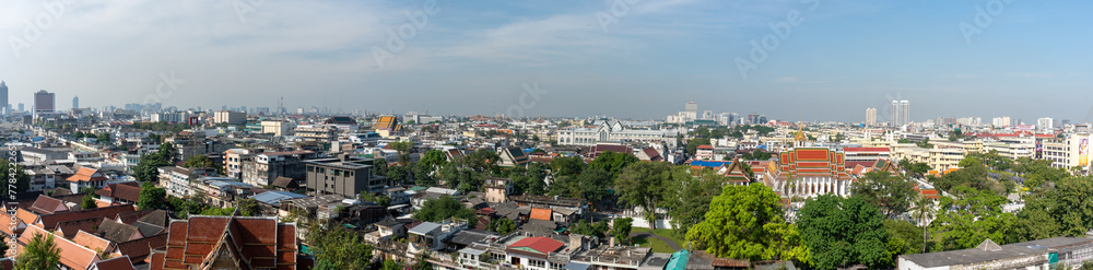 Traditional Thai Architecture with Modern Buildings and Skyscrapers in Background. Cityscape of Bangkok, Thailand as Seen from Temple of the Golden Mount (Wat Saket).