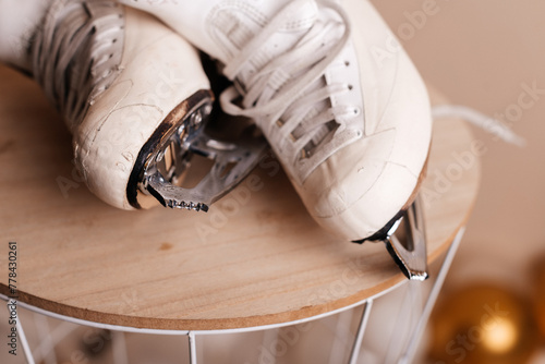 professional figure skating boots covered with protective tape photo