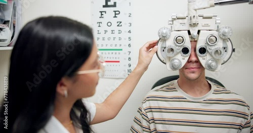 Patient, eye test and doctor with machine in hospital, medical facility and clinic for results. Expert, optometrist and healthcare professional with man by opthalmoscope, research and optical health photo